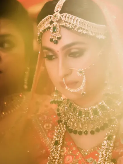An artistic, soft-focus shot of the bride, creating a dreamy and ethereal mood.
