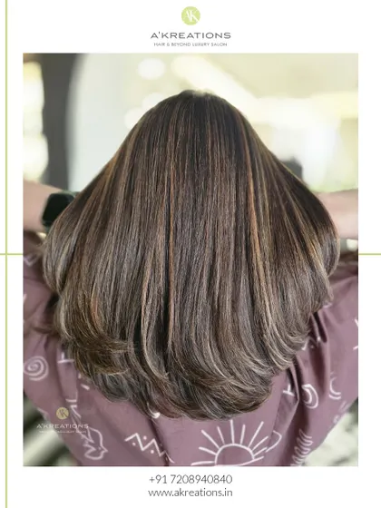 A back view of the copper brown color, showing how the layers and tones create a beautiful, voluminous look.