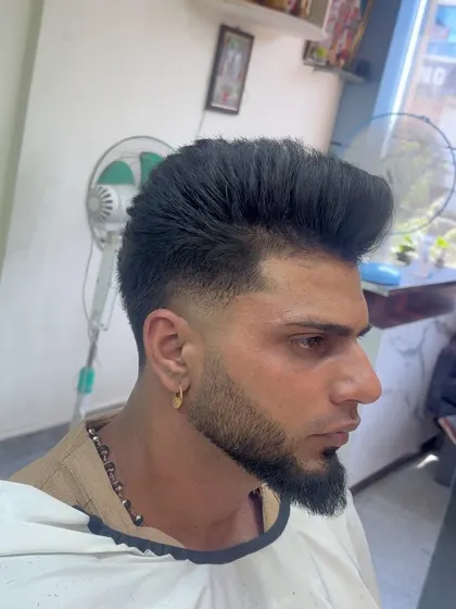 A classic pompadour with a modern twist.
