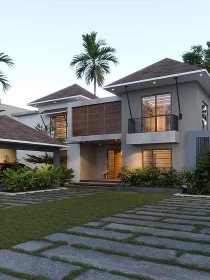 This design features a mix of flat and sloped roofs, with jali screens used in the carport for decorative ventilation.