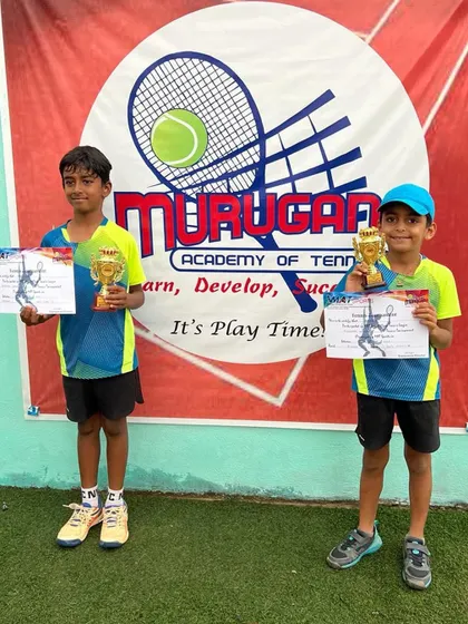 Avyaan and Ashvika with their trophies after a successful tournament.
