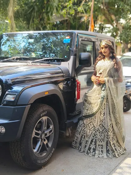 Another shot of the green and silver lehenga with the Thar. This look is a perfect blend of traditional elegance and modern swag.