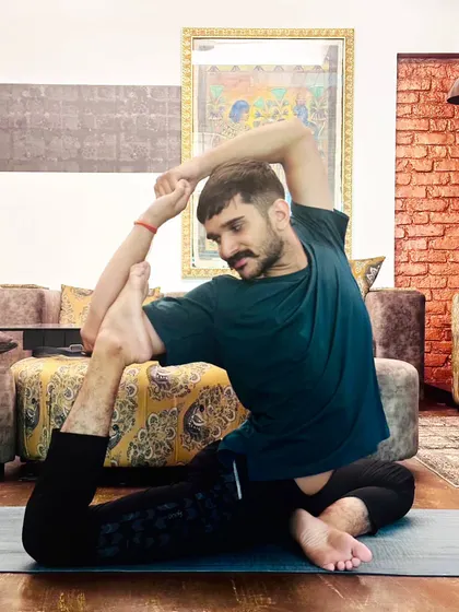 Working on Eka Pada Rajakapotasana (One-Legged King Pigeon Pose). This deep backbend is a powerful heart opener and stretches the entire front of the body.