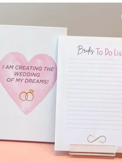 A "Bride's To-Do List" notepad and a journal for "Creating the wedding of my dreams." A thoughtful and practical gift for the organized bride.