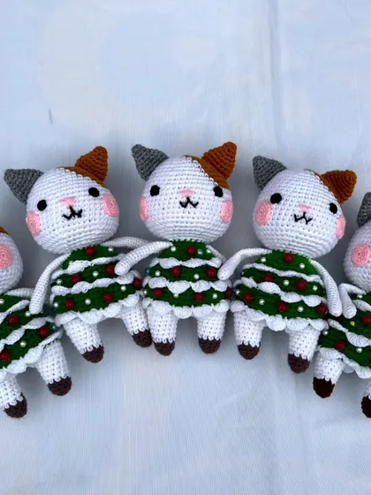 These cute little cats are dressed up in their Christmas tree dresses. I love making special items for the holidays.