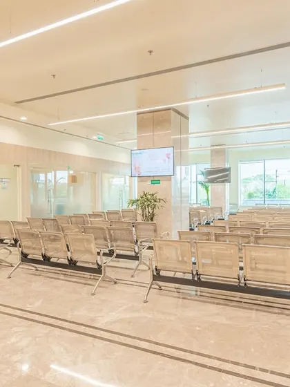 Fortis Hospital in Greater Noida was converted from a hotel into a 300-bed multi-speciality facility. This waiting area leverages the building's original generous proportions to create a spacious and comfortable patient zone.