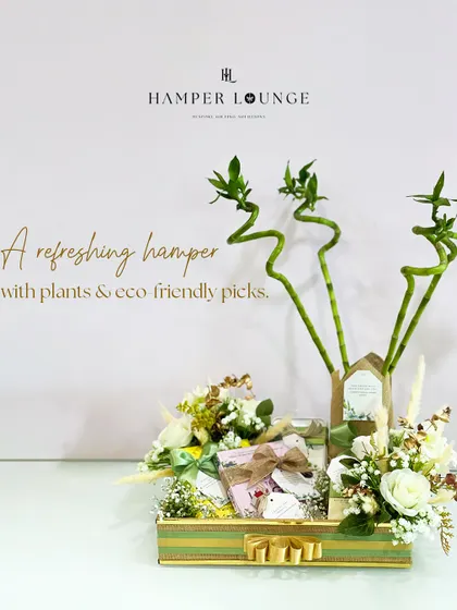 Gifting can be beautiful and sustainable. This eco-friendly hamper features lucky bamboo plants, fresh white florals, and a selection of mindfully chosen, sustainable goodies, all presented in a reusable tray. It’s perfect for housewarmings or for anyone who appreciates nature.