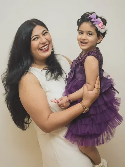 A daughter is a wonder that fills a mother with great joy. This photo from a birthday celebration captures a beautiful moment between mother and daughter.