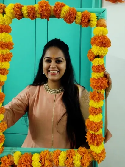 Posing with our festive photo frame. It's all about creating happy memories and connections that last long after the event is over.