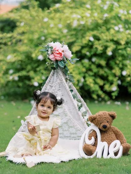 A beautiful setup for a first birthday girl, with a lace teepee and a teddy bear. I love creating personalized and pretty scenes for these milestone shoots.