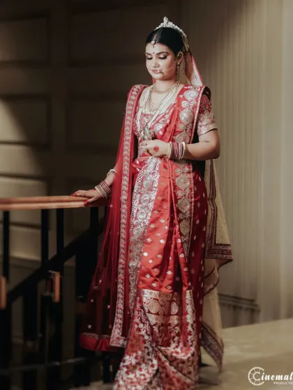 An elegant bridal portrait on a staircase, using the architectural lines and soft lighting to create a classic and sophisticated look.