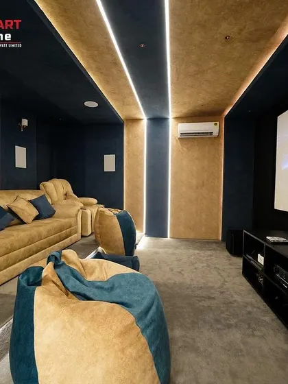 This shot from the side shows the flexible seating arrangement, which includes bean bags for casual viewing, making it a great space for the whole family.