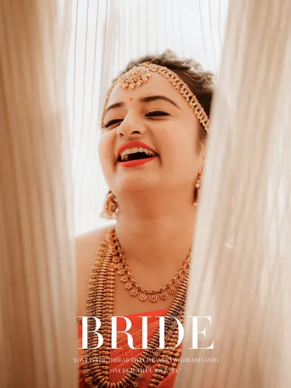 A duplicate of image 58, a beautiful portrait of a laughing bride, full of life and happiness.