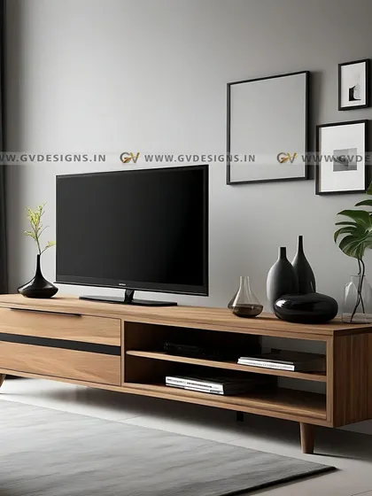 This sleek TV base unit is crafted with high-quality wooden laminate and designed for modern living. It features open shelving for easy access to devices and is supported by tapered wooden legs, making it a durable and easily movable piece for any home.