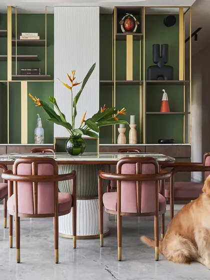 A full view of the dining setup in the "Whimsical House," a project that blends playful colors with sophisticated design. The space is designed to be both beautiful and functional for the whole family.