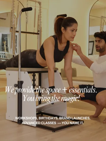 We provide the space, the state-of-the-art equipment, and the expert guidance. This image captures a moment of personalized instruction on the Pilates chair, ensuring proper form and alignment to help you get the most out of every movement.