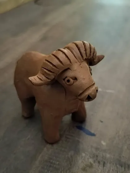 Another angle of the wild gaur clay model, showcasing the details that kids can learn to create in our hands-on sessions.