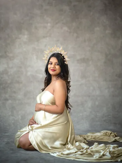 A seated version of the draped silk portrait, offering a look of serene elegance and timeless beauty.