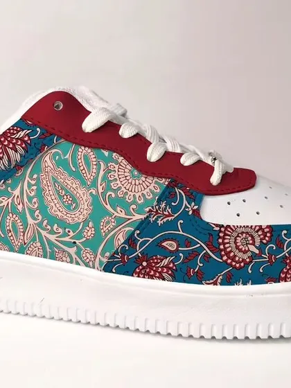 Another design for Liberty Shoes, this one inspired by the classic paisley motifs found in Indian textiles. The rich blues and reds create a timeless and elegant look.