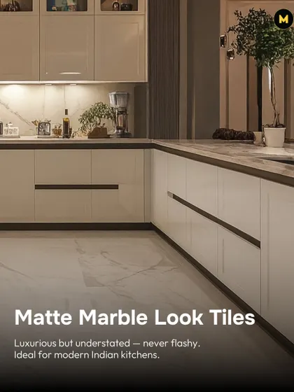 Matte marble-look tiles are luxurious but understated. They are ideal for modern Indian kitchens where you want a touch of elegance that isn't too flashy, providing a clean and sophisticated floor.