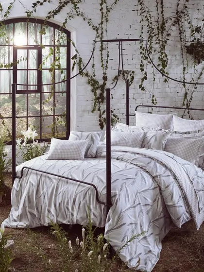 A product-focused shot from our indoor garden set. This image shows the complete bedding set in a highly atmospheric and unique environment, elevating it beyond a simple studio shot.