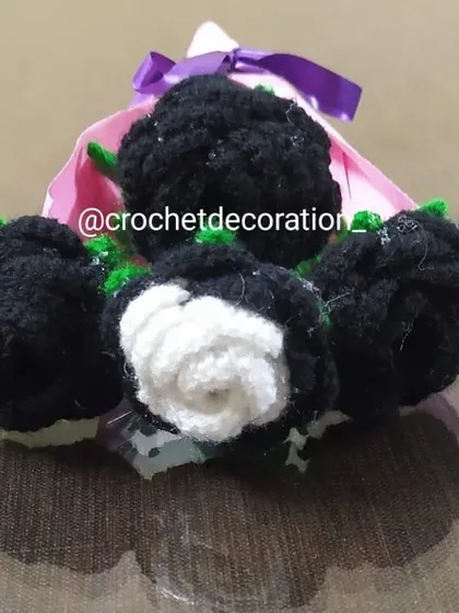 A close-up view of the black and white rose bouquet, highlighting the contrast and detail in each flower.