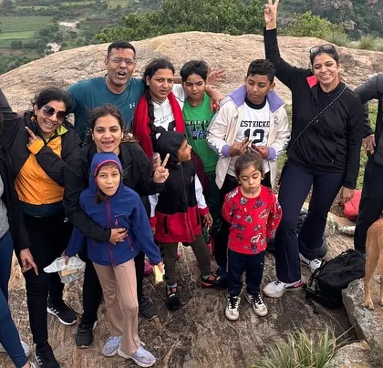 A happy family and group photo from the Kabbaladurga trek. It's a great way to spend a day outdoors with your loved ones.