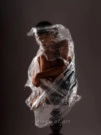 A conceptual photo from my "Every Body is Art" series. The plastic wrap creates a sculptural effect, transforming the human form into a piece of fine art.