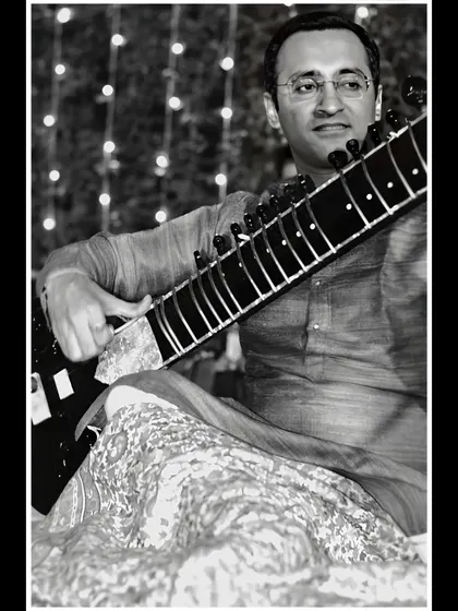 A wider black and white shot from the same performance.
