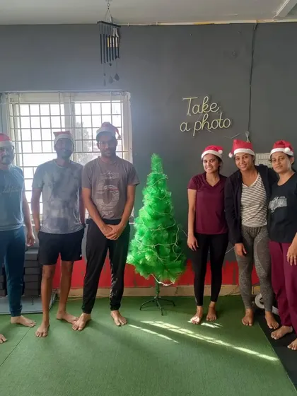 Another festive photo with our members in Santa hats. We love finding any excuse to celebrate and have fun together.