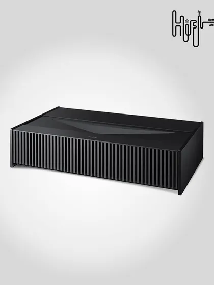 The sleek, minimalist design of the Sony VPL-VZ1000ES ultra-short-throw projector. It sits discreetly like a piece of furniture while delivering a breathtaking native 4K picture, blending technology and design.