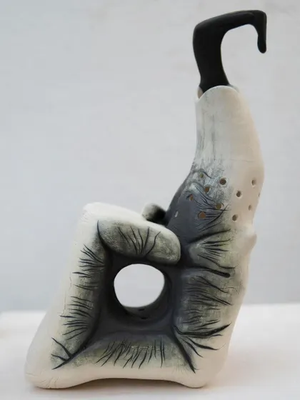 This powerful sculpture, "The Arm of a Western Hoolock Gibbon," was created by one of our foundation students. It tells the tragic true story of Kalia, the Lost Gibbon of Assam, and stands as a statement on ecosystem loss and animal abuse.