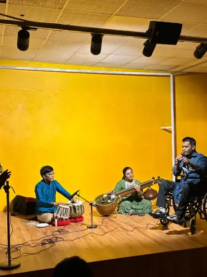 A wider view of the performance stage at Karmasthan. The space is equipped with professional lighting and sound to provide a great experience for both performers and the audience.