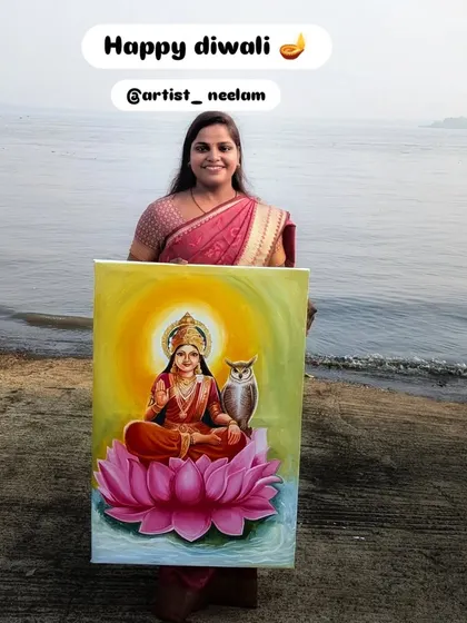 Happy Diwali! Here I am with my painting of Goddess Lakshmi, seated on a lotus. I took this picture by the water to connect the artwork with the natural elements.