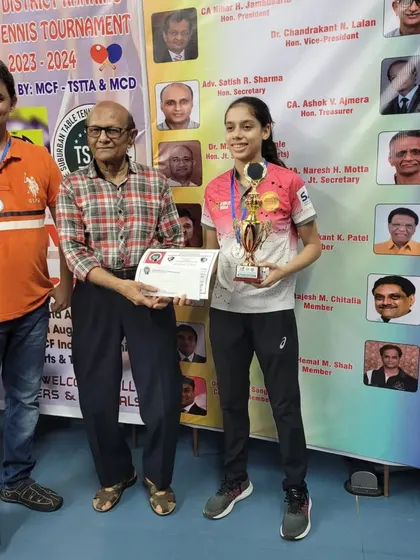Ananya Chande receiving her silver medal at the 4-Star District Tournament at MCF, Borivali. Her consistent podium finishes are a testament to her hard work.