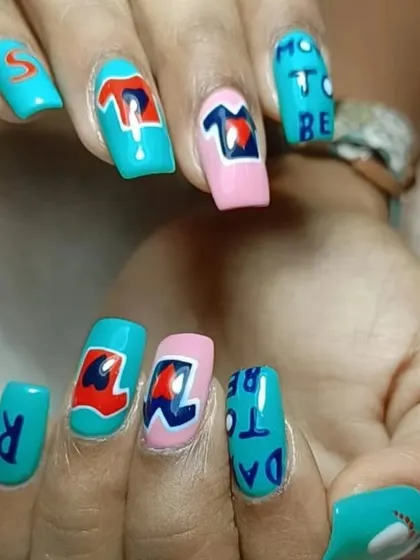 A fun and personalized "Mom-to-be" themed manicure. This set features hand-painted letters, t-shirts, and baby footprints to celebrate a special announcement.