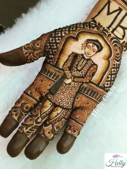 A stunning portrait of a Maharashtrian groom, capturing the details of his traditional wedding attire. This is a perfect example of how I can incorporate cultural elements into a personalized mehndi design.