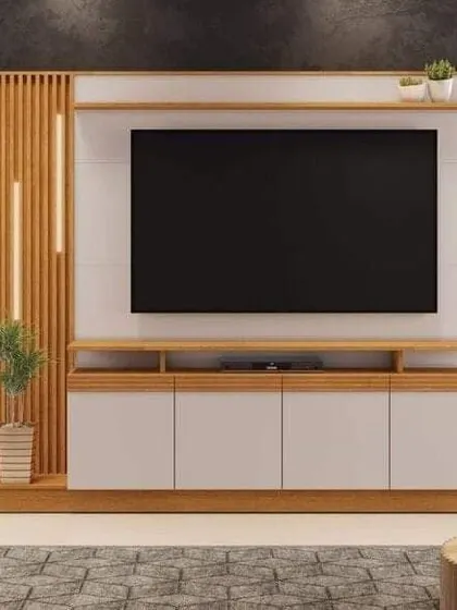 A modern entertainment unit featuring a mix of wood and white finishes. The vertical wood slats with backlighting add a stylish, decorative touch.