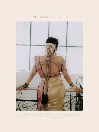 A professionally captured photograph showcasing the elegance of a South Indian bridal braid from the back. The intricate weaving and floral arrangement are highlighted, showing the artistry involved.
