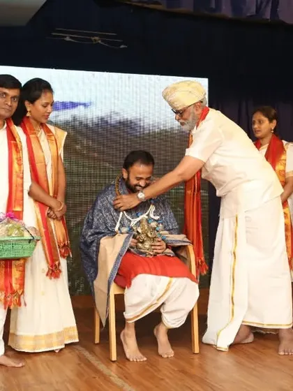 It is a profound moment to see students complete their training and receive their honors. Here, I am being felicitated by my students during our 12th-anniversary graduation ceremony, a testament to the beautiful Guru-Shishya tradition.