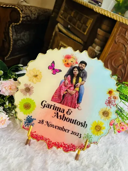 This photo shows the resin plaque displayed on its metal stand, making it a perfect decorative piece for a shelf or table. The stand is available as an optional add-on.