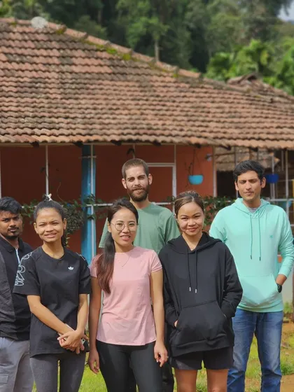 The same group posing at the resort, ready for their Kodachadri adventure.