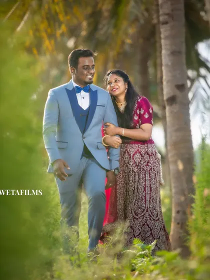 A candid walking shot from a pre-wedding session. We capture the natural interactions and smiles that happen between poses, telling a more complete story.