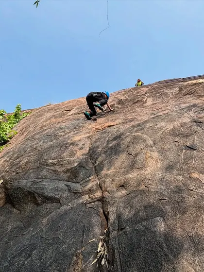 A young adventurer tackles a rock climbing challenge with focus and determination. We provide certified instructors and safe equipment to help participants push their limits and discover their strength.