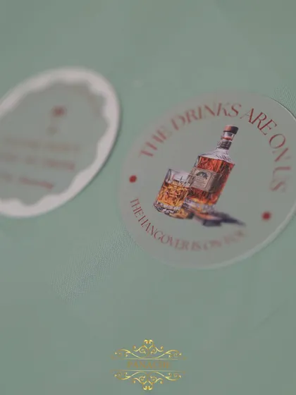 Custom coasters for the after-party, with a fun design and message.