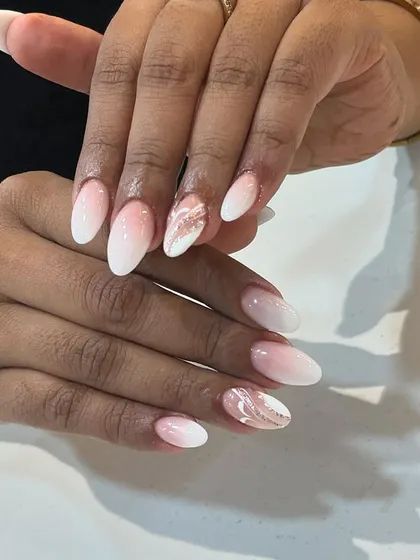 Our classic ombré nails are a popular choice. The soft gradient is elegant and perfect for any occasion.