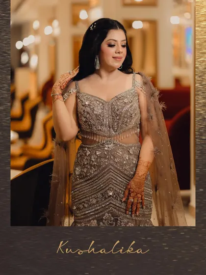 A solo portrait of the bride looking radiant in her embellished gown. We take the time to capture individual shots that showcase the bride's style and elegance during her evening celebration.