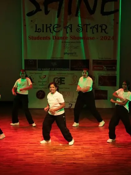 A group of our male students performing an energetic routine with strong stage presence.