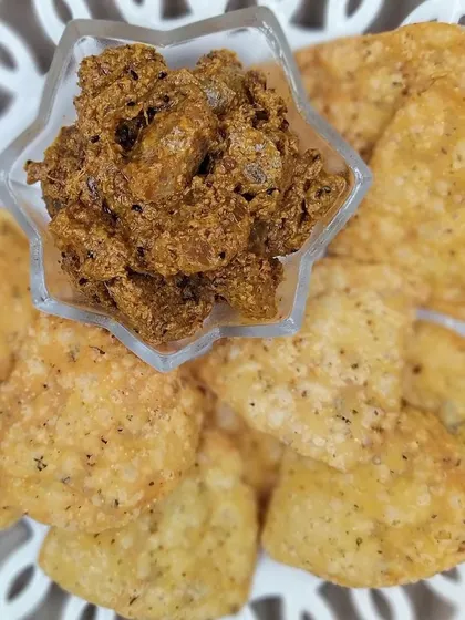 A perfect combination of my tangy Amla ka Achaar served with crispy Ajwain ki Mathri. The Indian Gooseberry pickle is not only delicious but also full of health benefits, making it a tasty and wholesome snack.