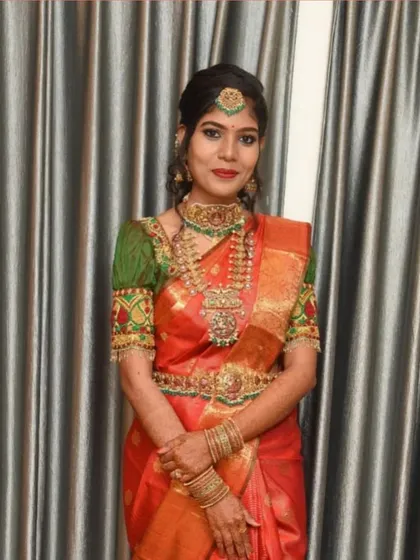 This happy client looks absolutely beautiful in her orange saree and traditional temple jewellery. It’s a joy to see my pieces become part of such special moments.